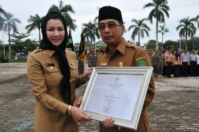 bupati rita widyasari kukar panji keberhasilan pembangunan dpd golkar pilkada pilgub kaltim